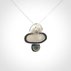 Hand crafted Sterling Silver with Mother of Pearl and Blue Eyris Pearl pendant