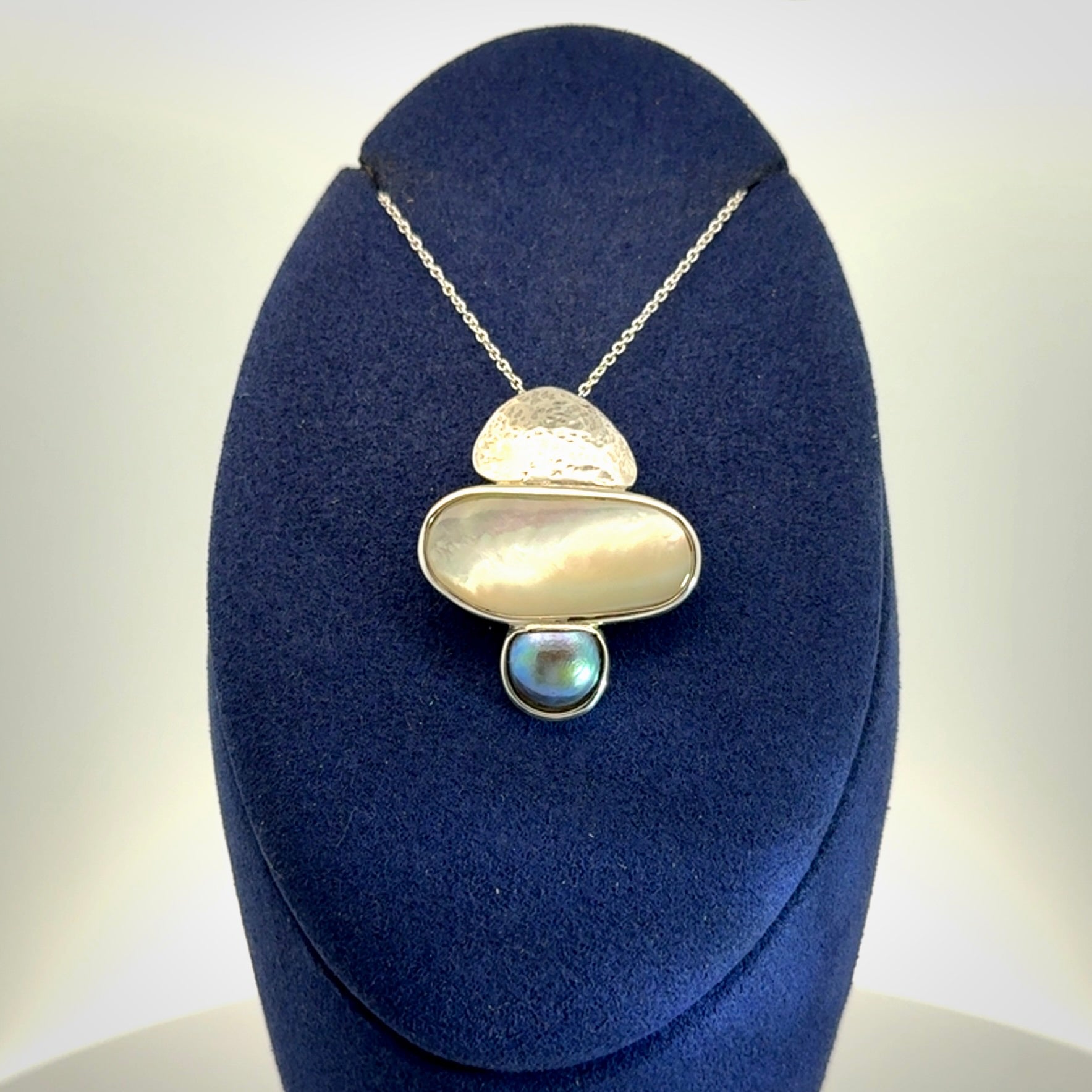 Hand crafted Sterling Silver with Mother of Pearl and Blue Eyris Pearl pendant