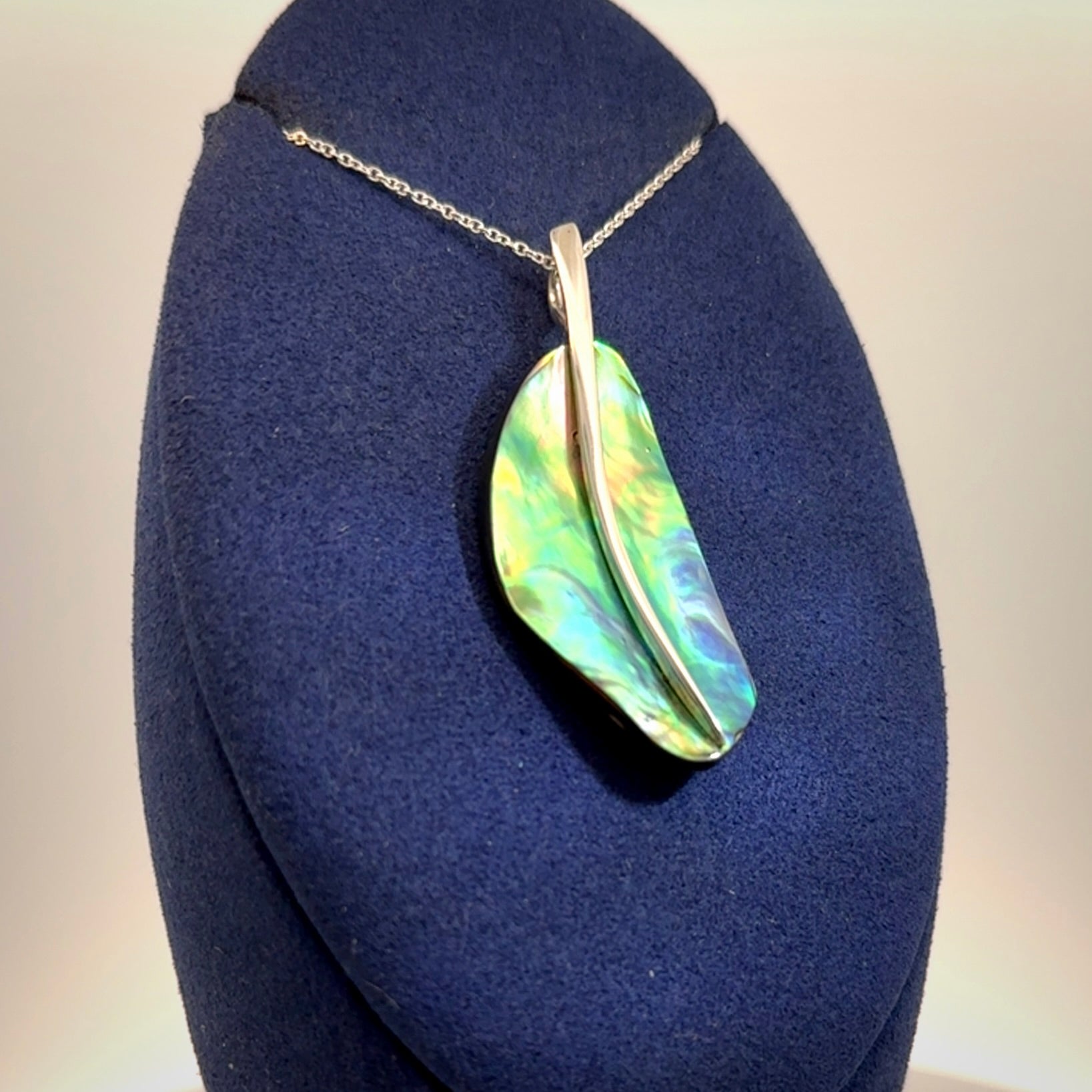 Paua shell with sterling silver pendant