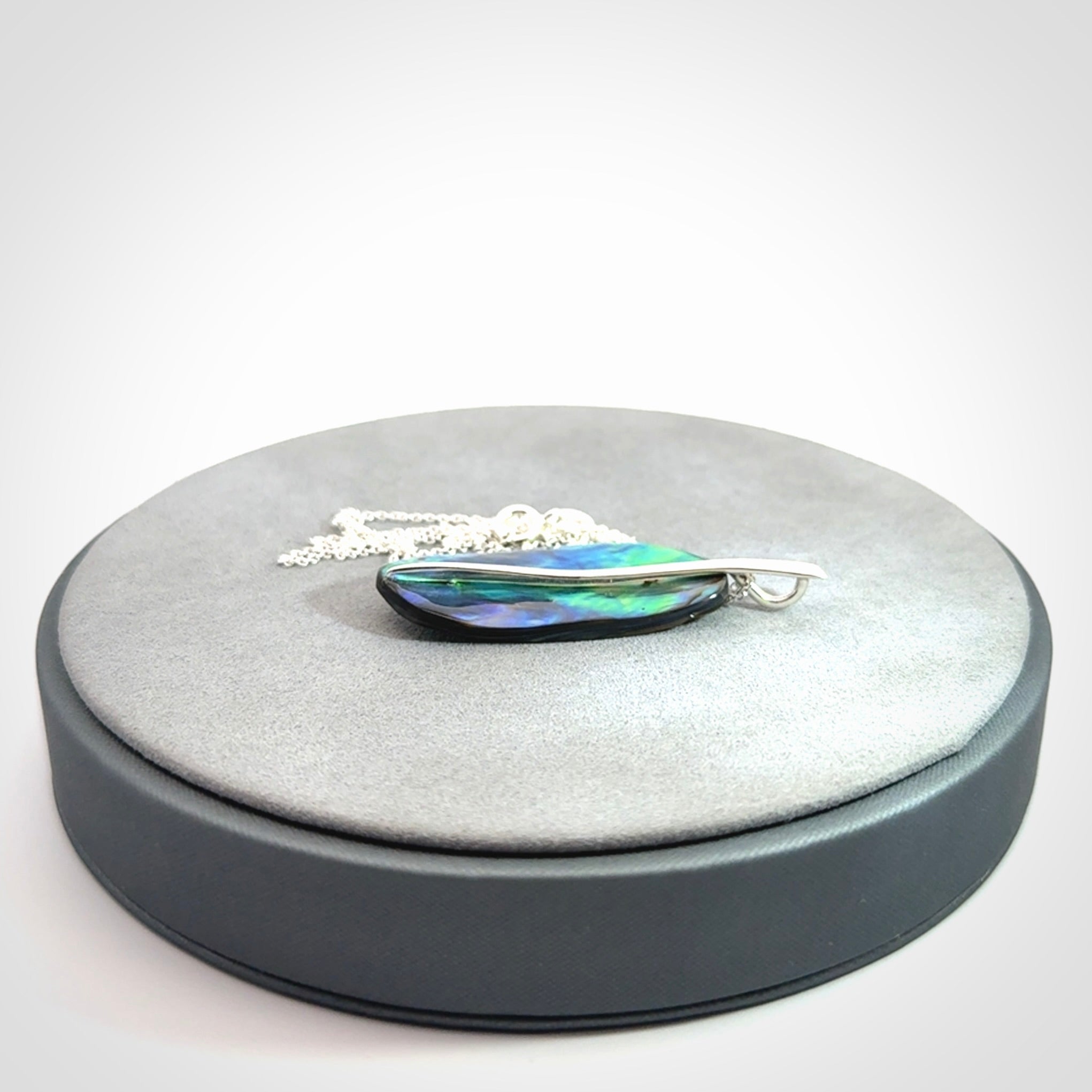 Paua shell with sterling silver pendant