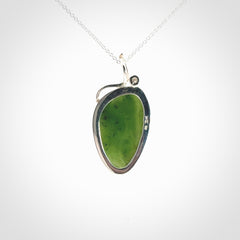 A Beautiful New Zealand Jade and Sterling Silver Pendant