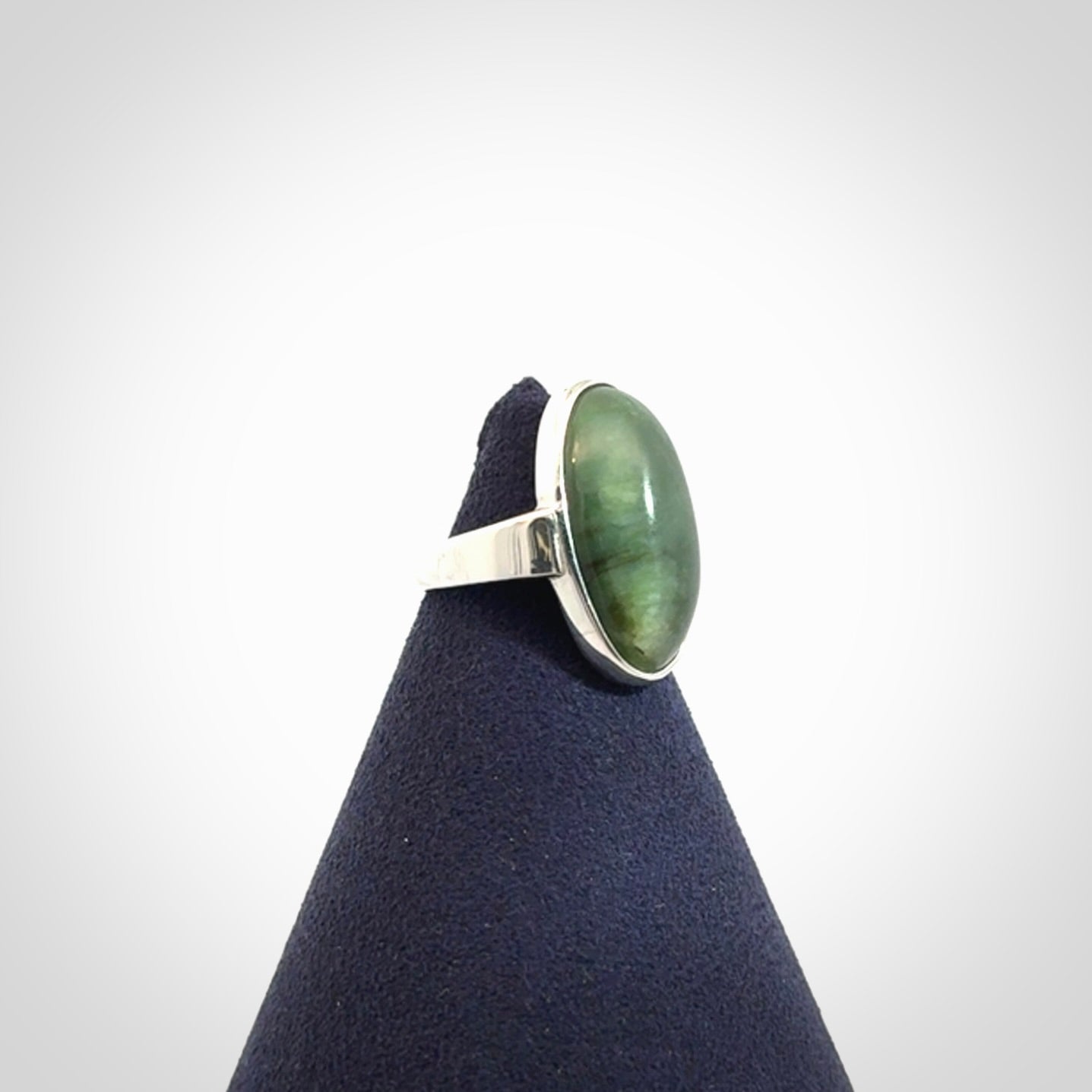 Sterling silver ring with chatoyant New Zealand Jade insert