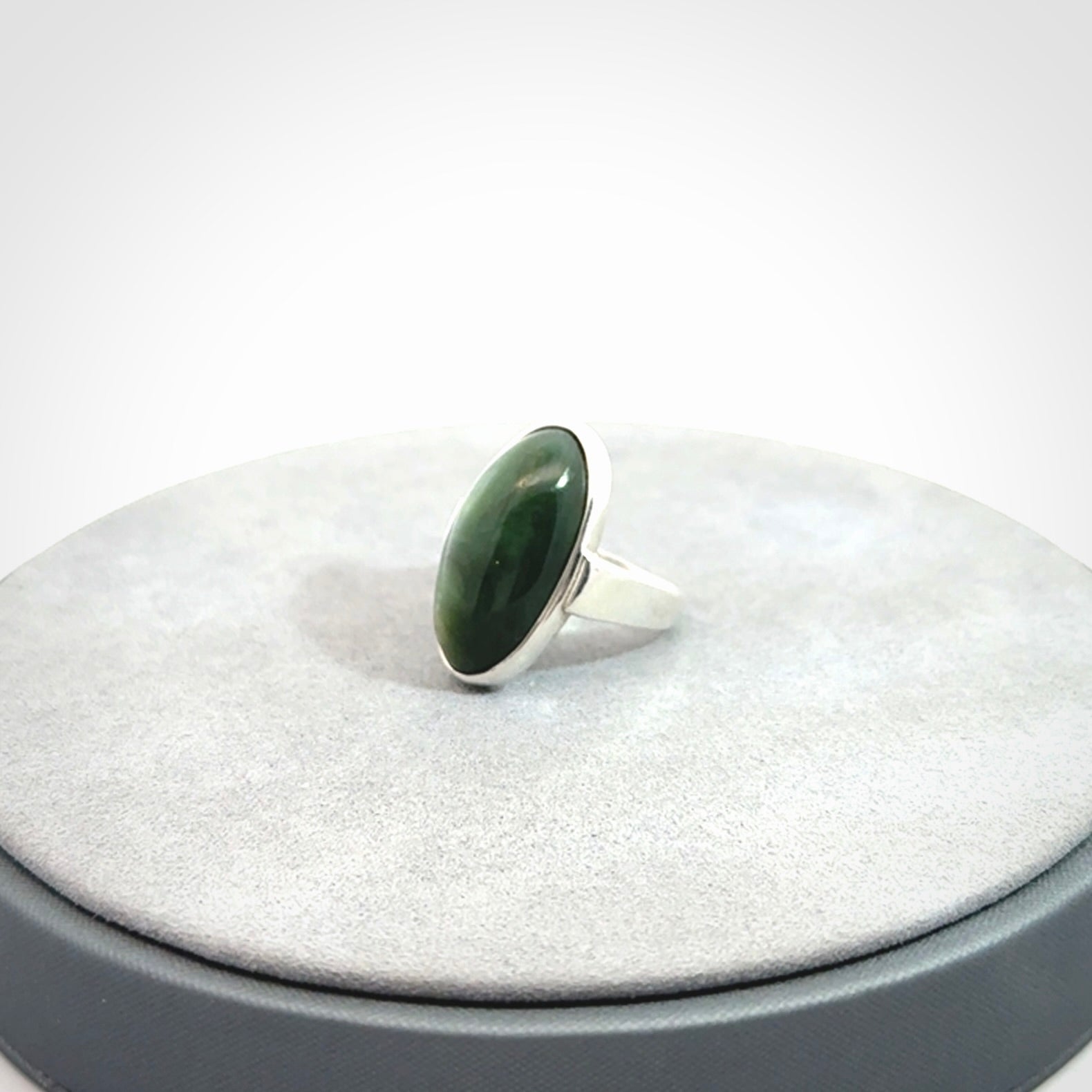 Sterling silver ring with chatoyant New Zealand Jade insert