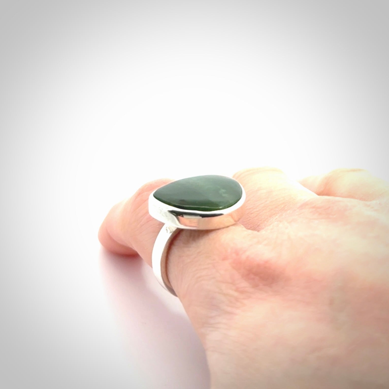 A Beautiful Pounamu, Jade, and Sterling Silver Ring