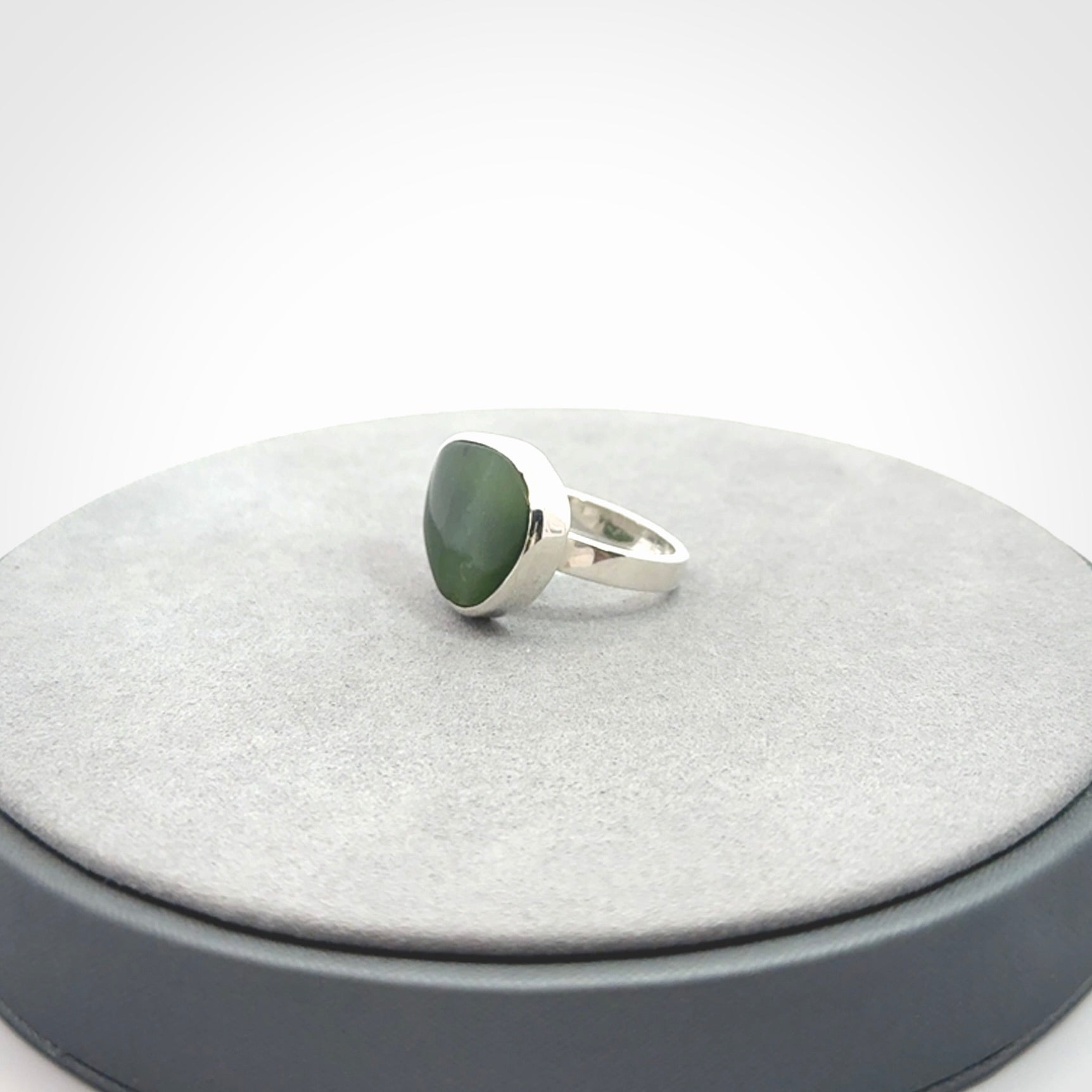 A Beautiful Pounamu, Jade, and Sterling Silver Ring