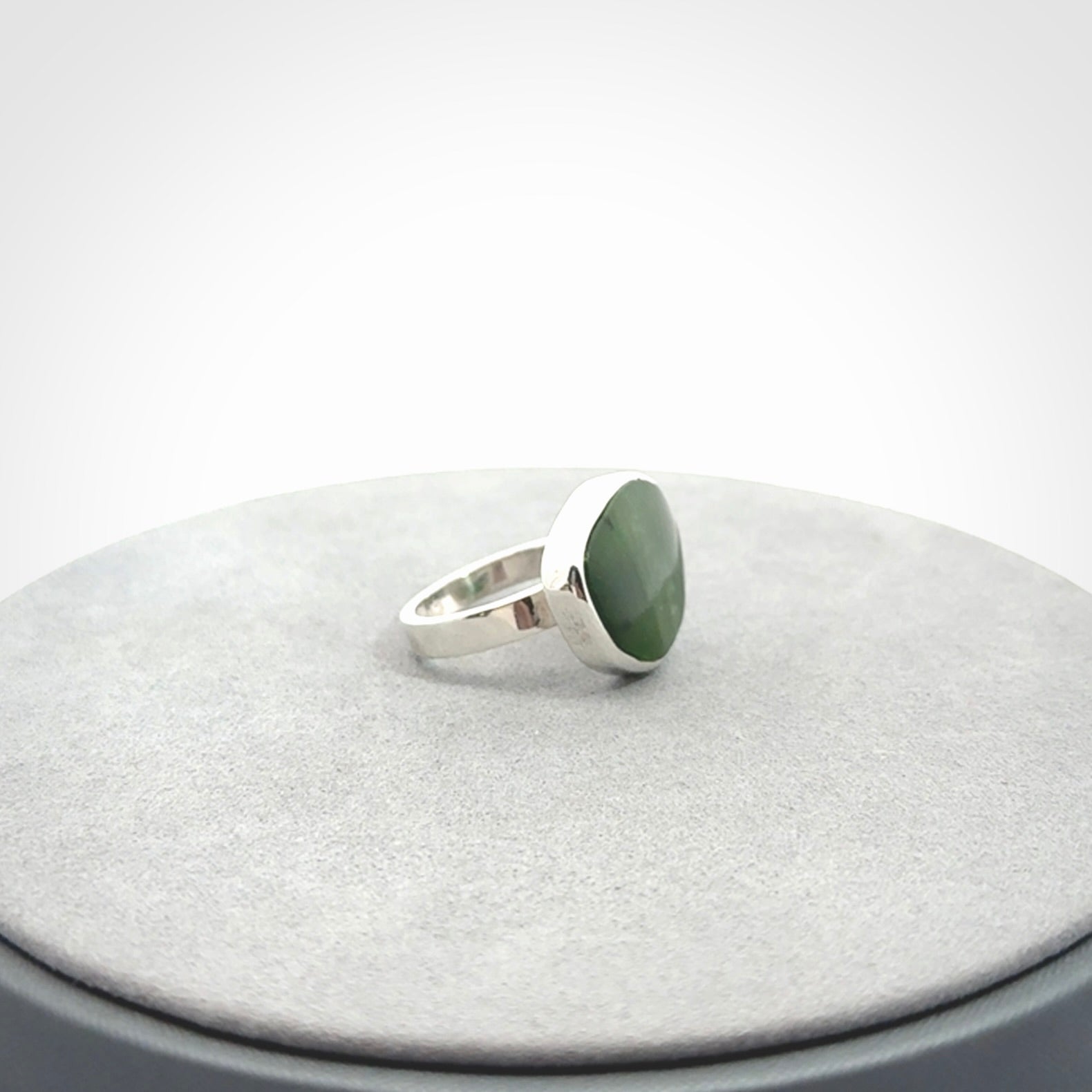 A Beautiful Pounamu, Jade, and Sterling Silver Ring