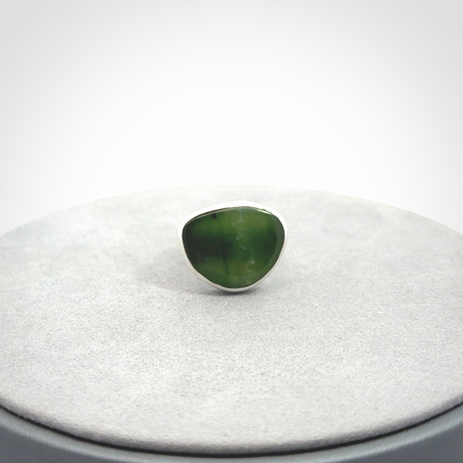 A Beautiful Pounamu, Jade, and Sterling Silver Ring