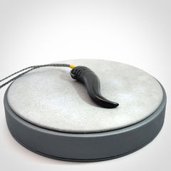 Black jade Italian Horn pendant. Handmade jade jewellery made by NZ Pacific and for sale online. Black Jade Goat Horn pendant worn for protection over evil eye, bad luck and promotes fertility. Ancient symbolic necklace hand made in Australian Black Jade.