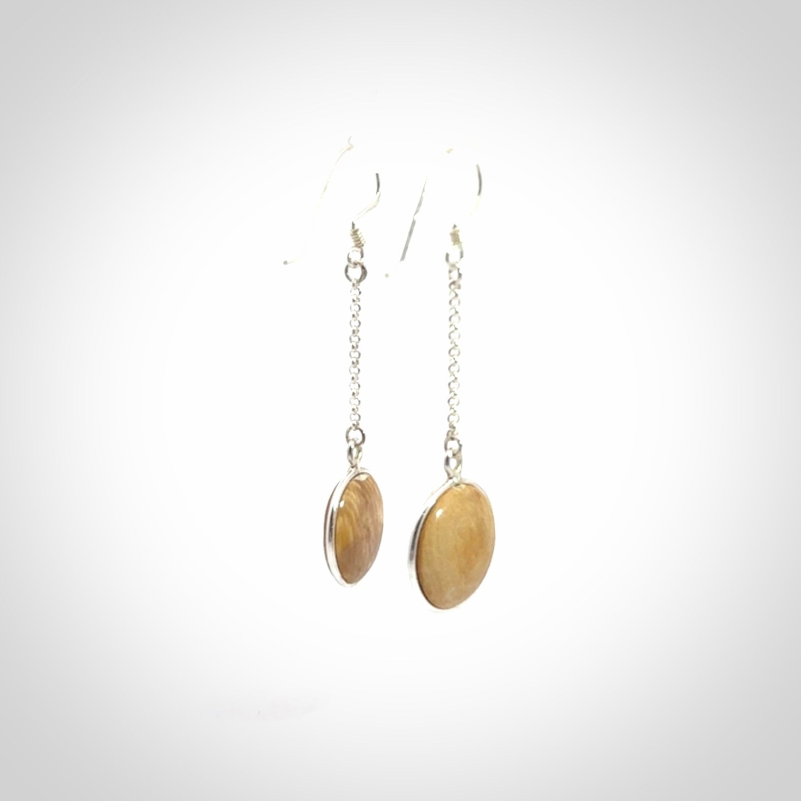 Hand made woolly mammoth tusk earrings. Made by NZ Pacific and sale online only.