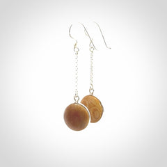 Hand made woolly mammoth tusk earrings. Made by NZ Pacific and sale online only.