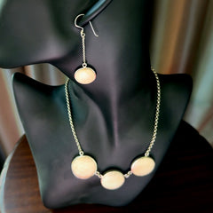 Hand made woolly mammoth tusk triple drop necklace with Sterling Silver and matching earrings.