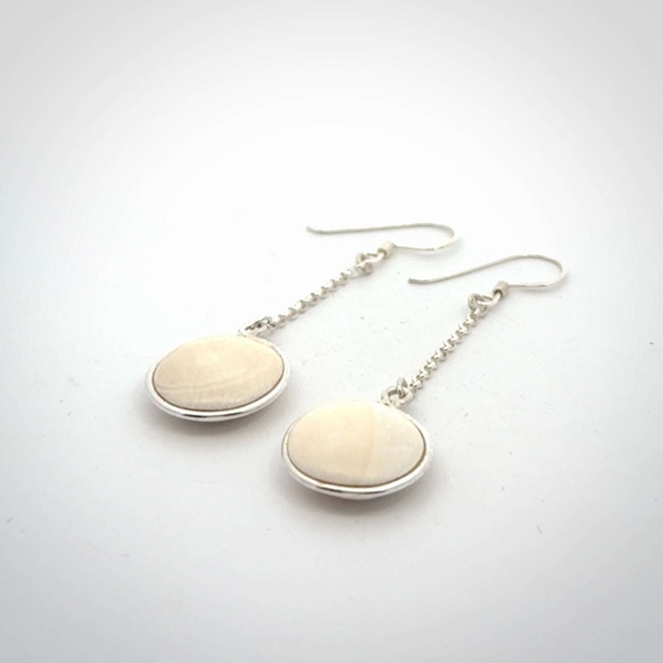 Hand made woolly mammoth tusk earrings. Made by NZ Pacific and sale online only.