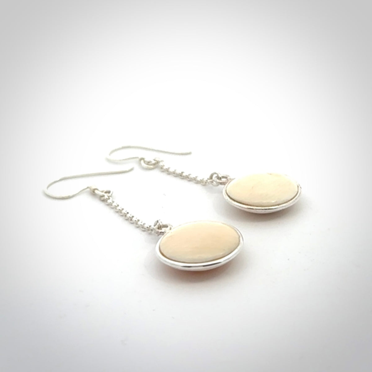 Hand made woolly mammoth tusk earrings. Made by NZ Pacific and sale online only.