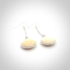 Hand made woolly mammoth tusk earrings. Made by NZ Pacific and sale online only.