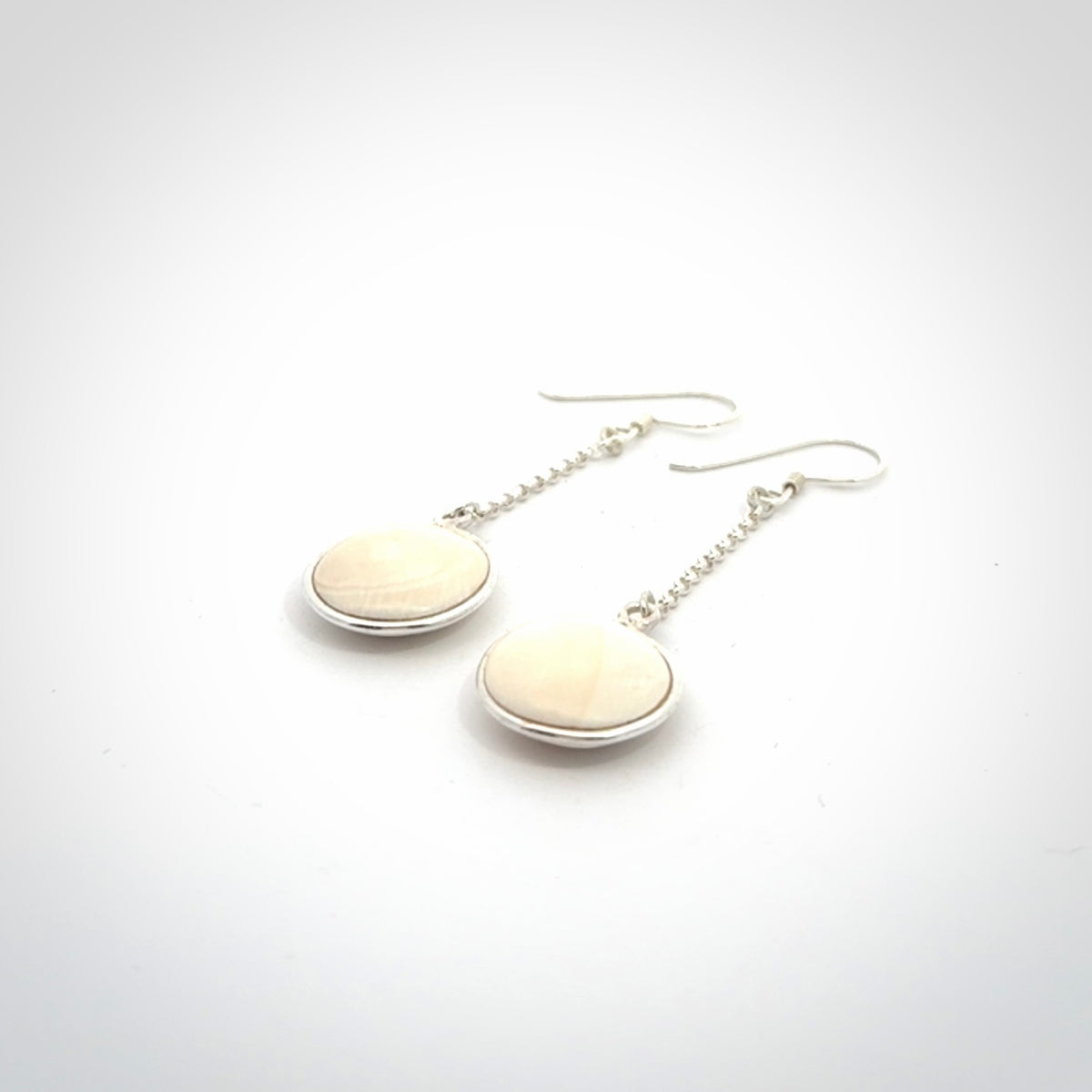 Hand made woolly mammoth tusk earrings. Made by NZ Pacific and sale online only.