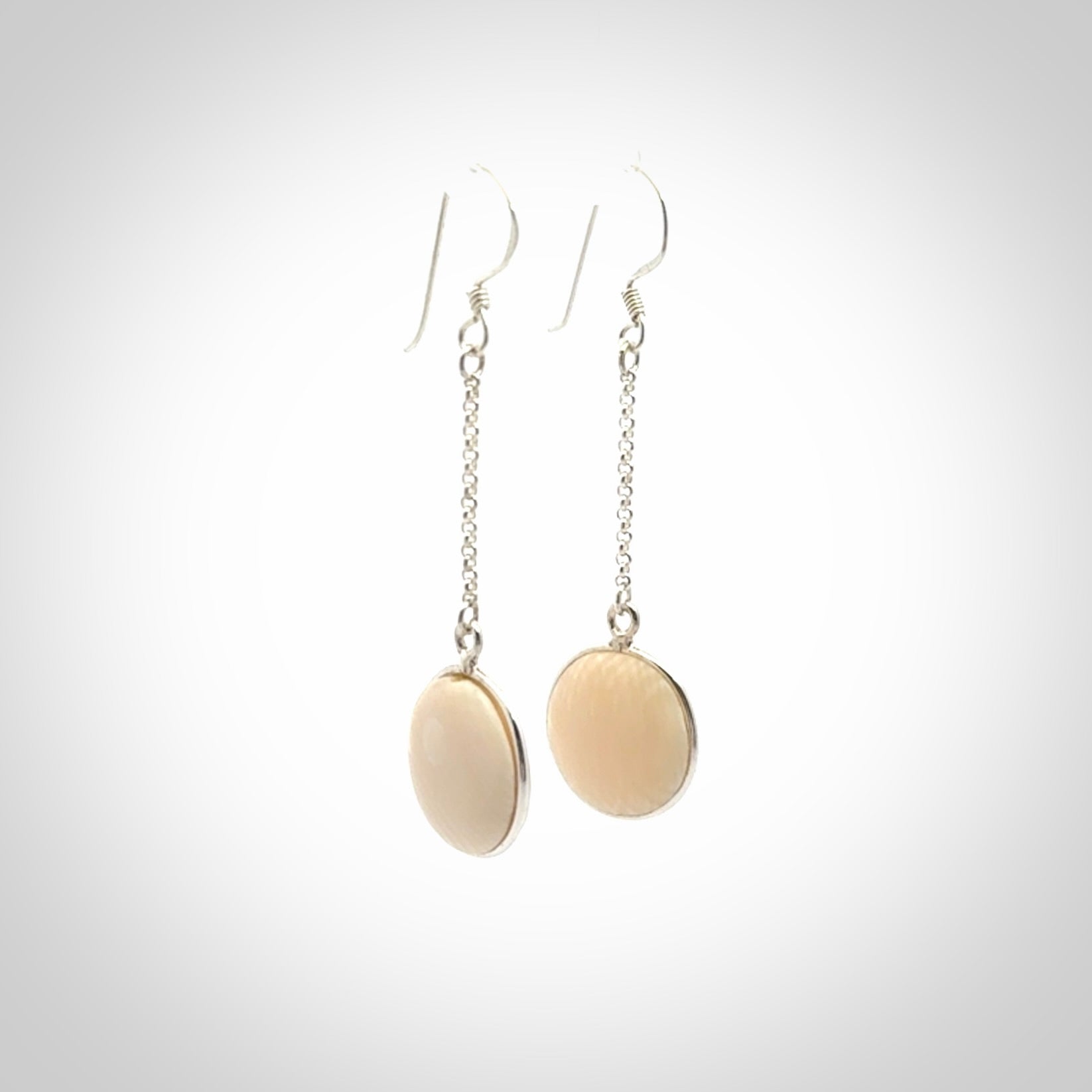 Hand made woolly mammoth tusk earrings. Made by NZ Pacific and sale online only.