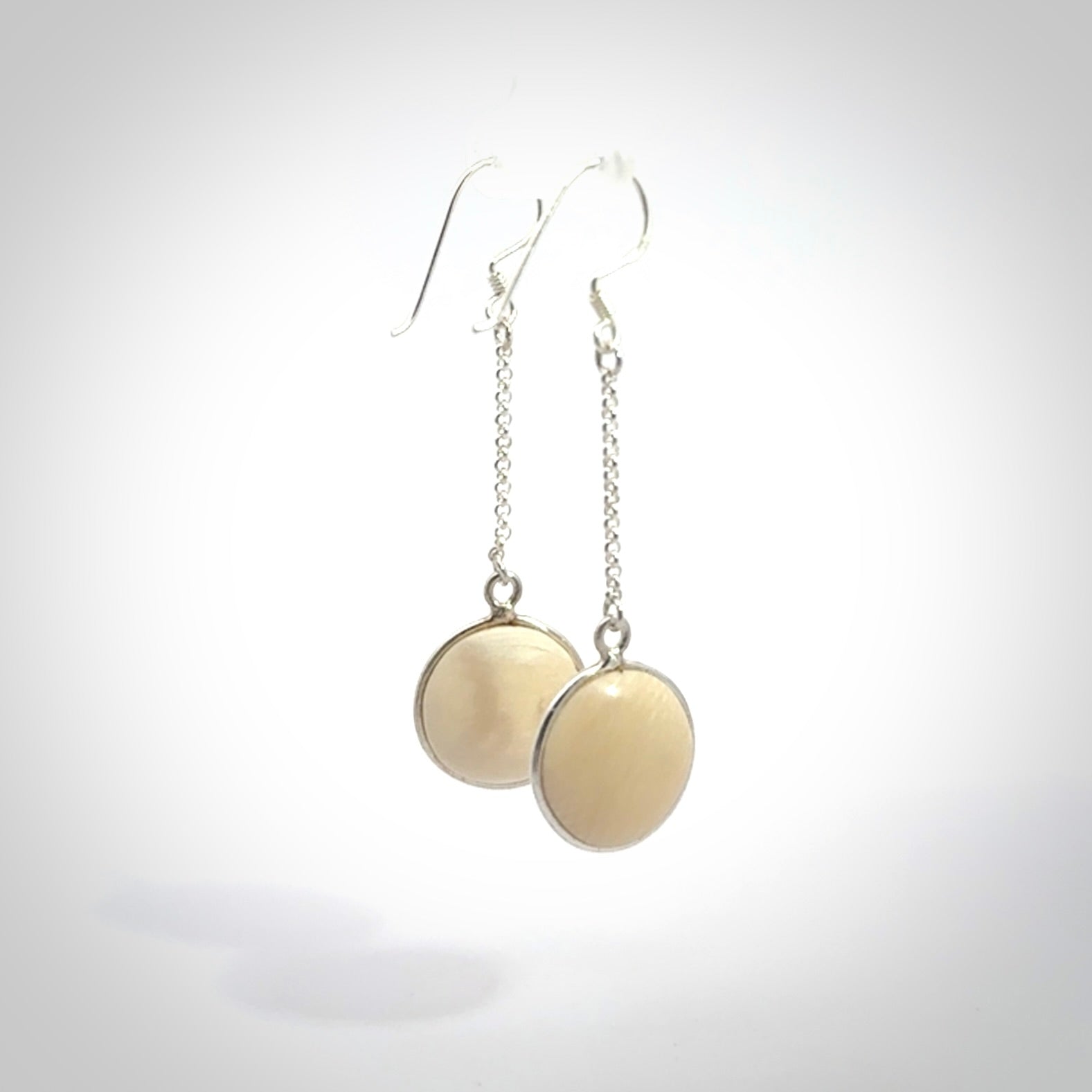 Hand made woolly mammoth tusk earrings. Made by NZ Pacific and sale online only.