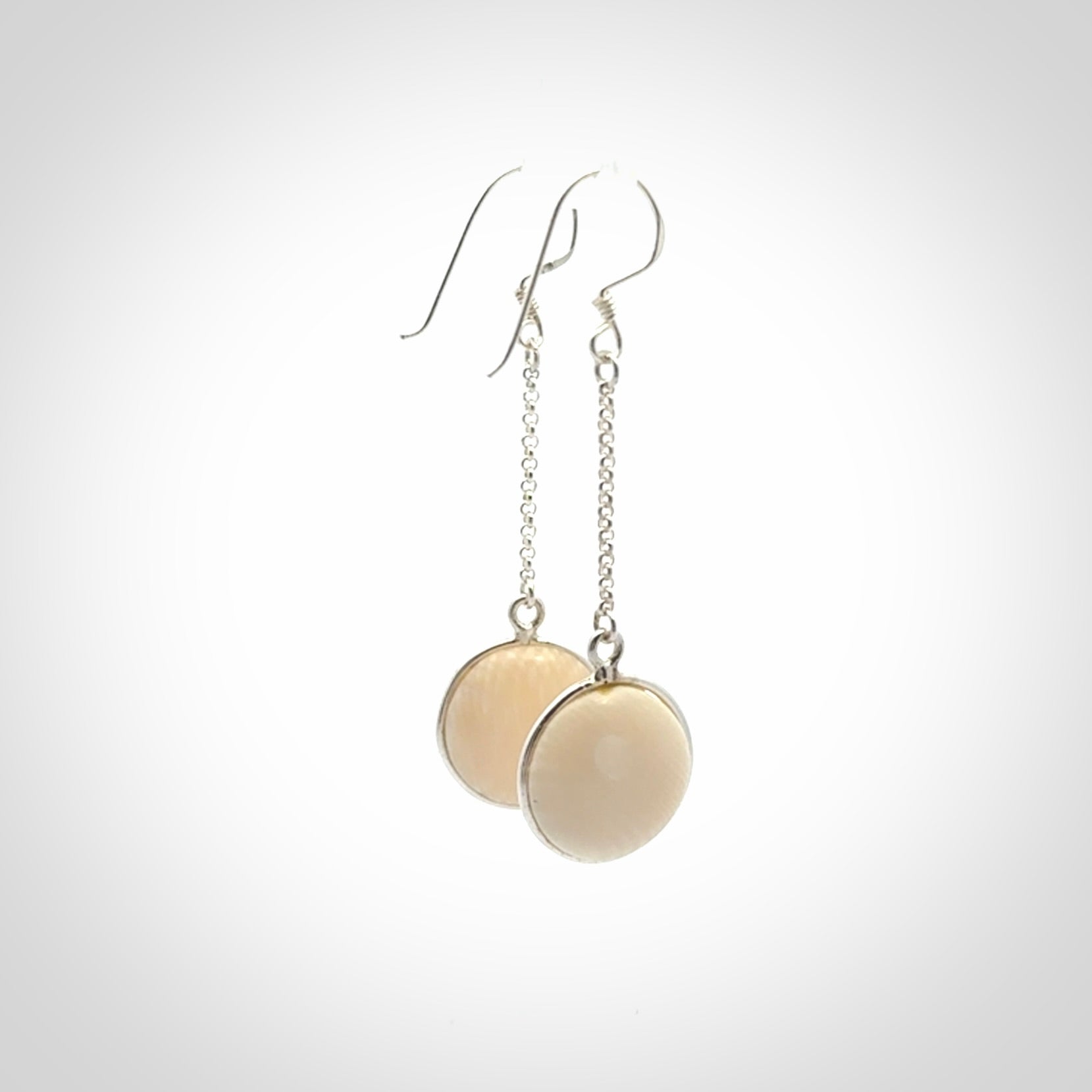 Hand made woolly mammoth tusk earrings. Made by NZ Pacific and sale online only.
