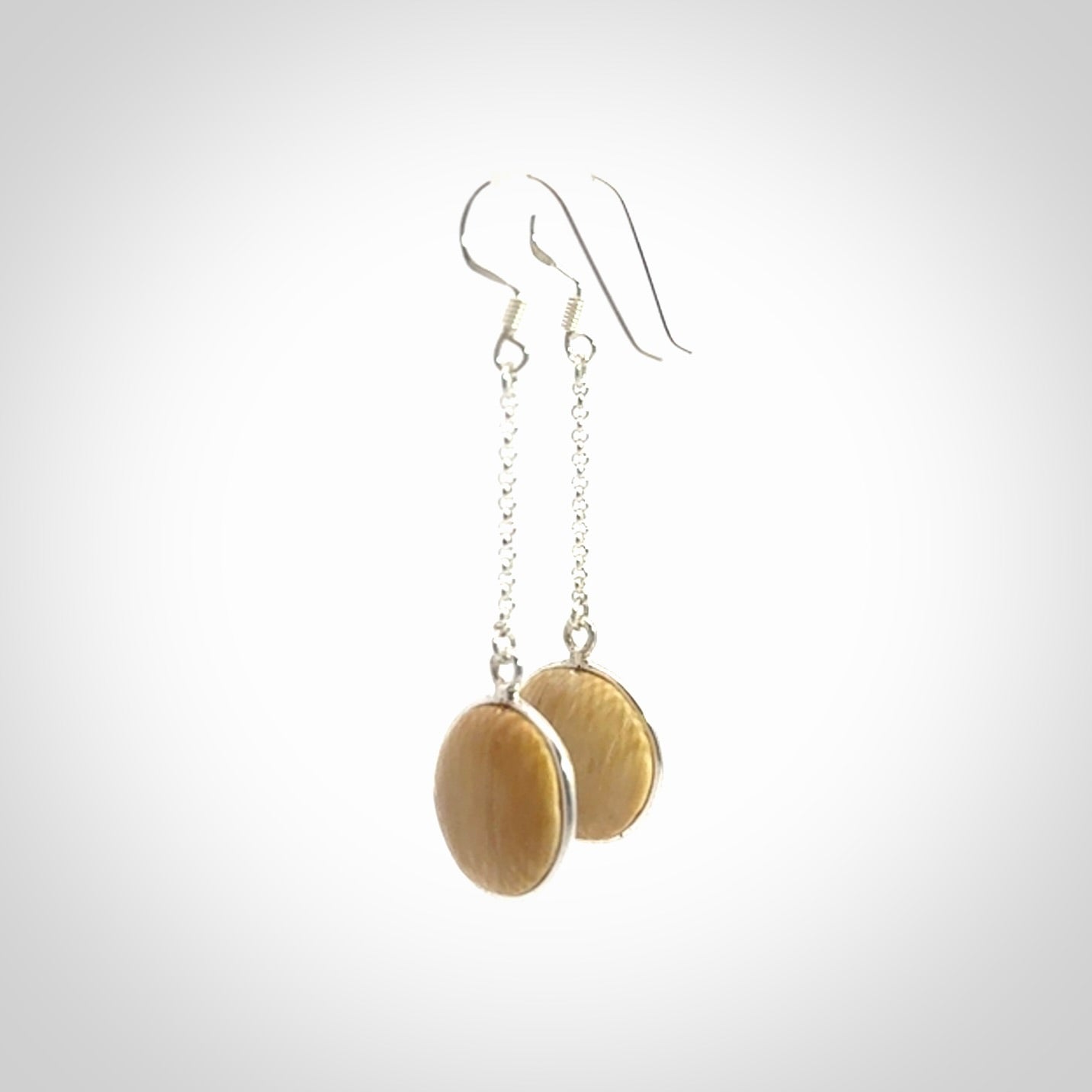 Hand made woolly mammoth tusk earrings. Made by NZ Pacific and sale online only.