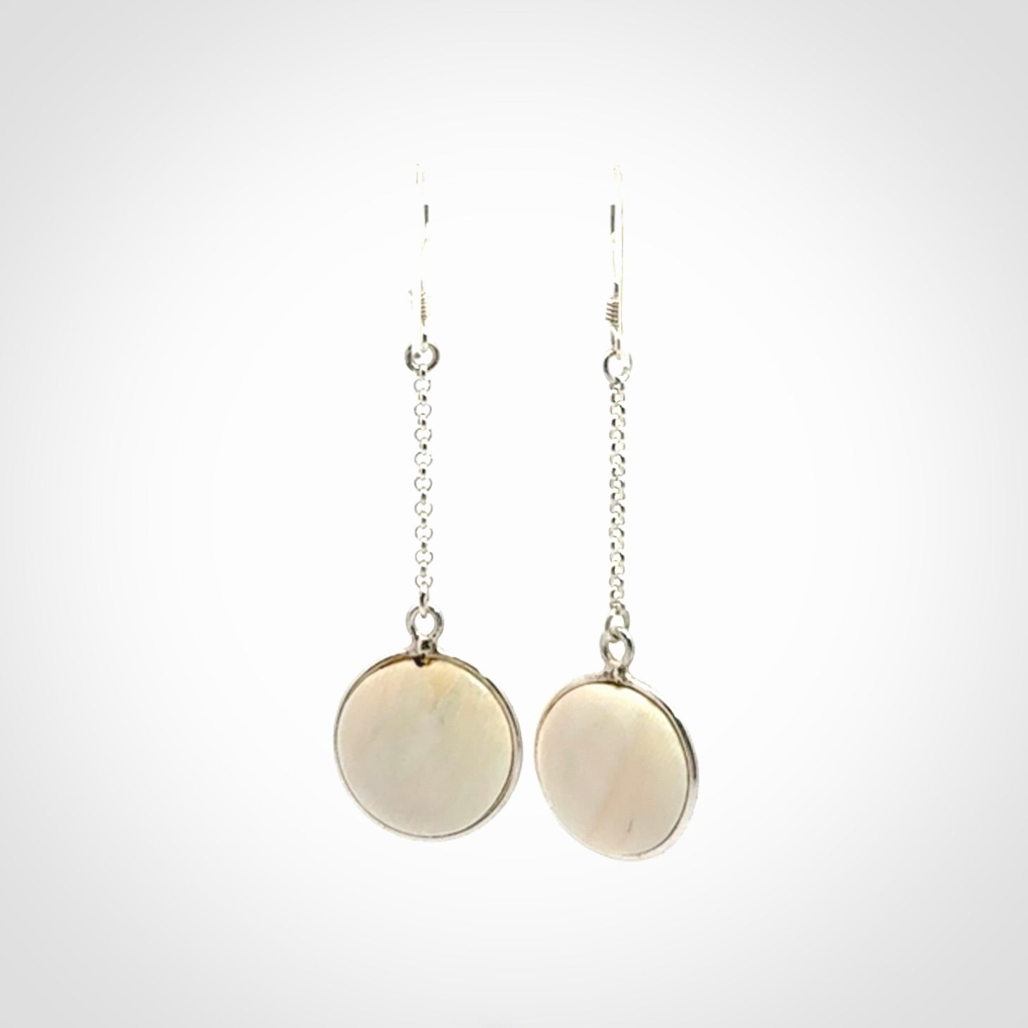 Hand made woolly mammoth tusk earrings. Made by NZ Pacific and sale online only.