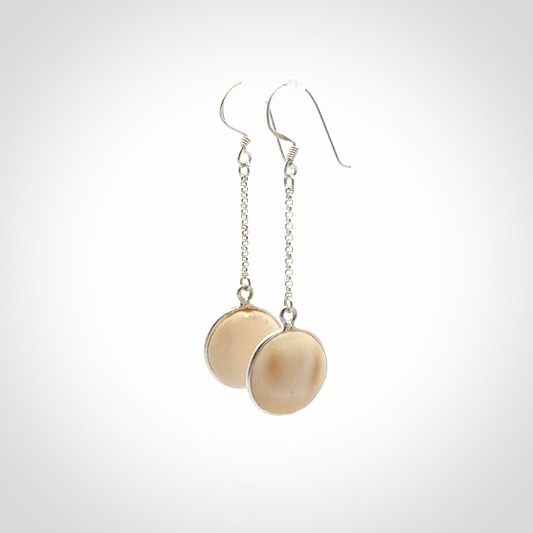 Hand made woolly mammoth tusk earrings. Made by NZ Pacific and sale online only.