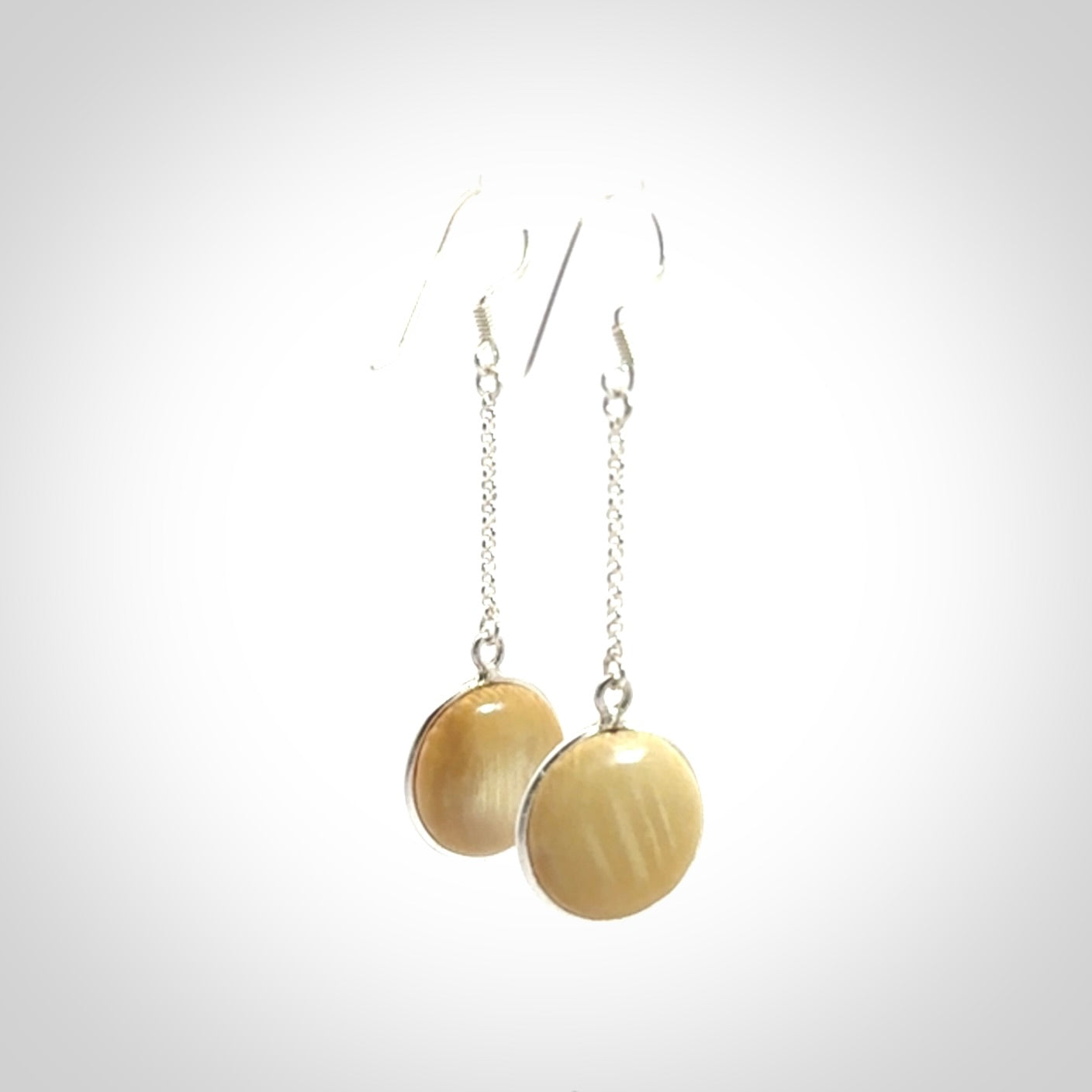 Hand made woolly mammoth tusk earrings. Made by NZ Pacific and sale online only.