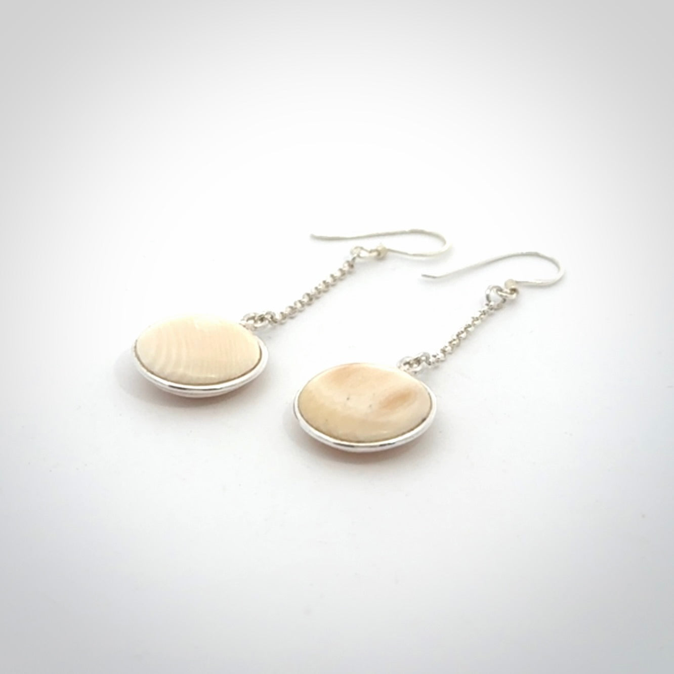 Hand made woolly mammoth tusk earrings. Made by NZ Pacific and sale online only.
