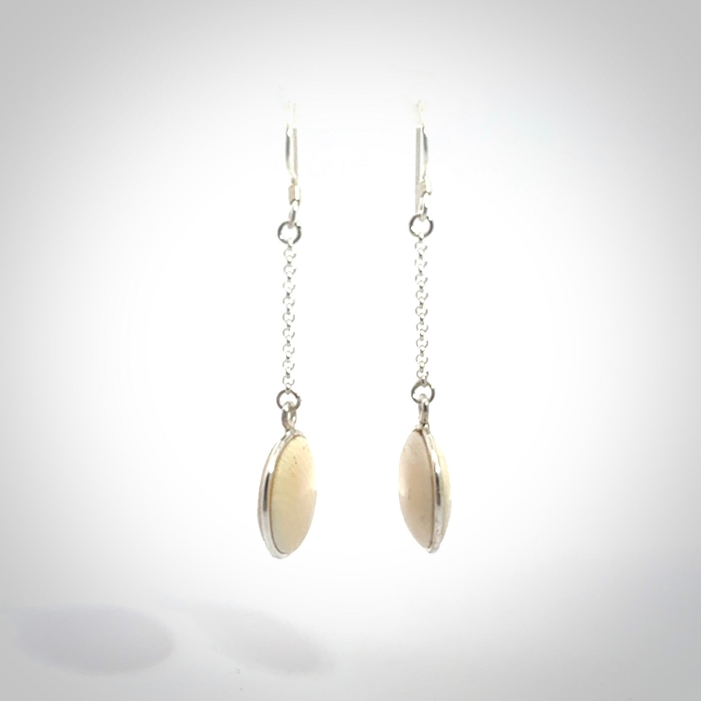 Hand made woolly mammoth tusk earrings. Made by NZ Pacific and sale online only.