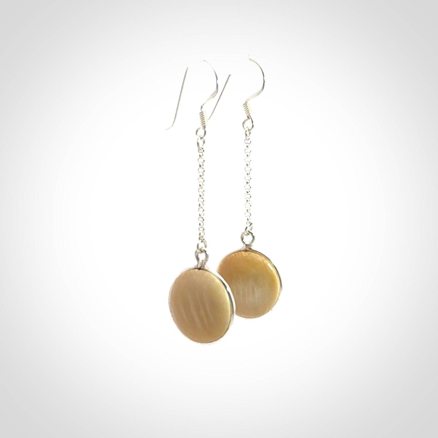 Hand made woolly mammoth tusk earrings. Made by NZ Pacific and sale online only.