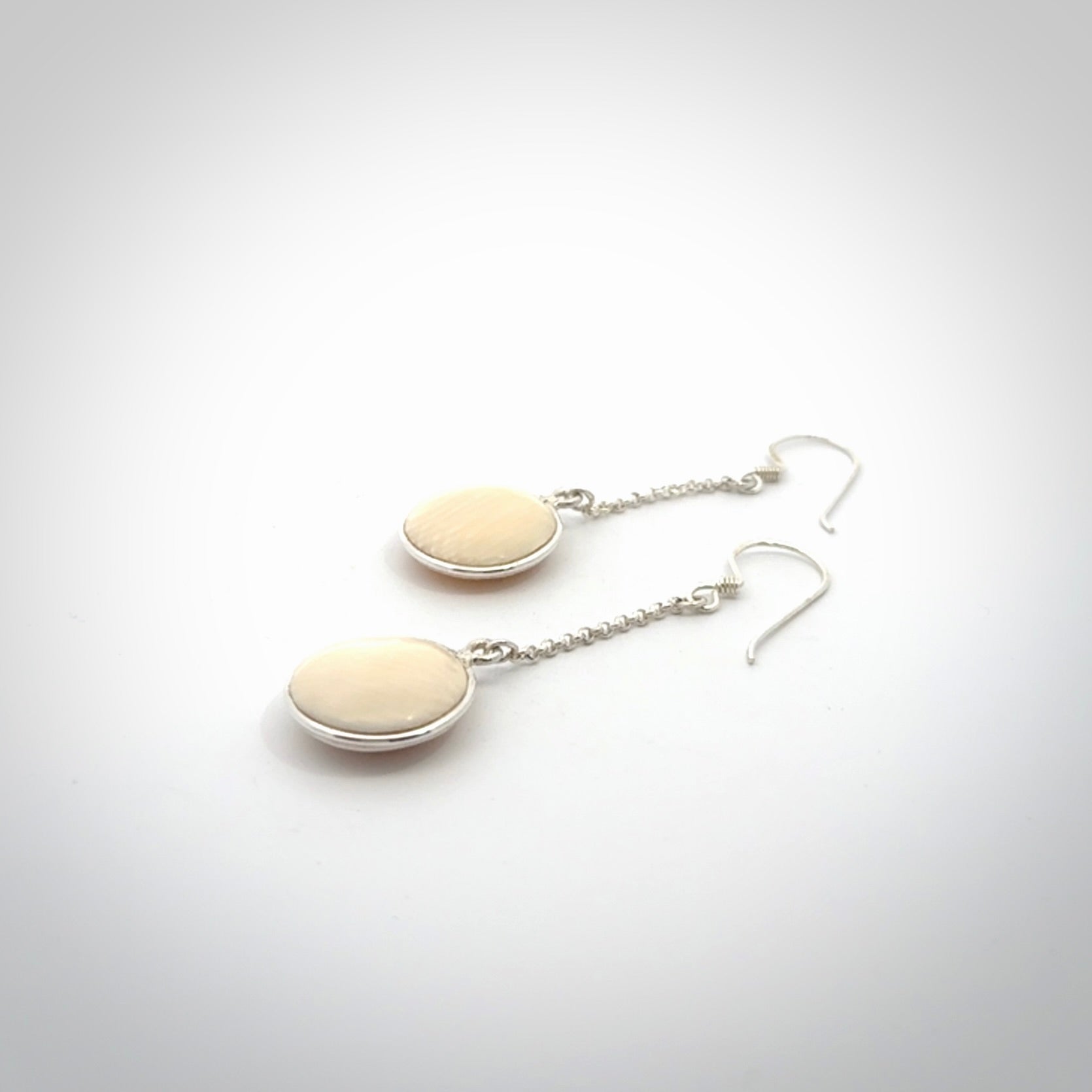 Hand made woolly mammoth tusk earrings. Made by NZ Pacific and sale online only.