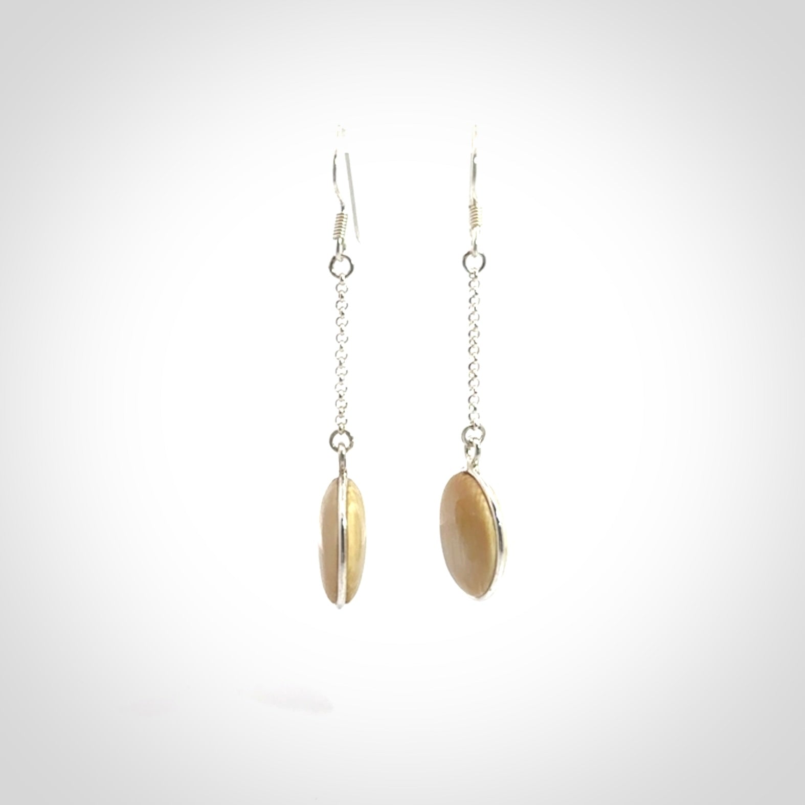 Hand made woolly mammoth tusk earrings. Made by NZ Pacific and sale online only.