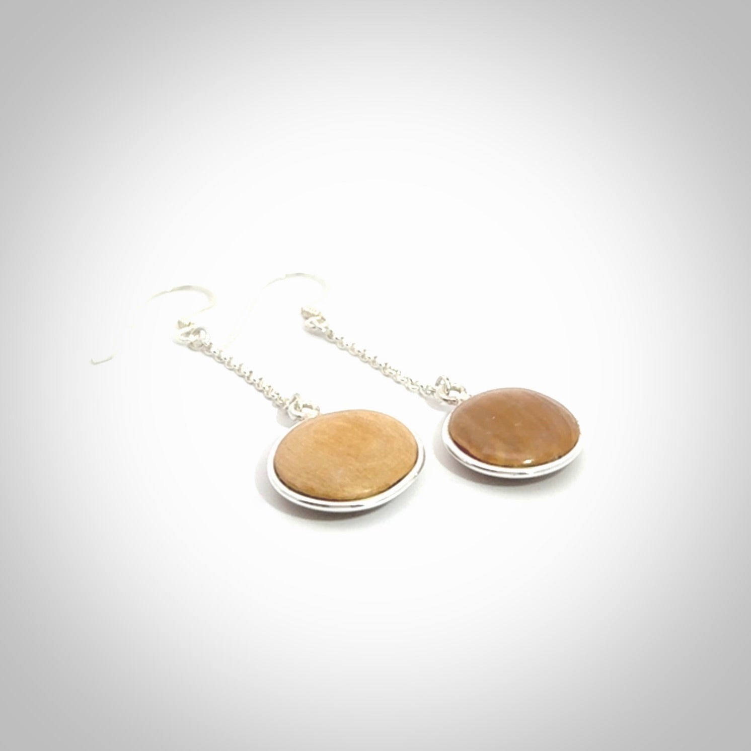 Hand made woolly mammoth tusk earrings. Made by NZ Pacific and sale online only.