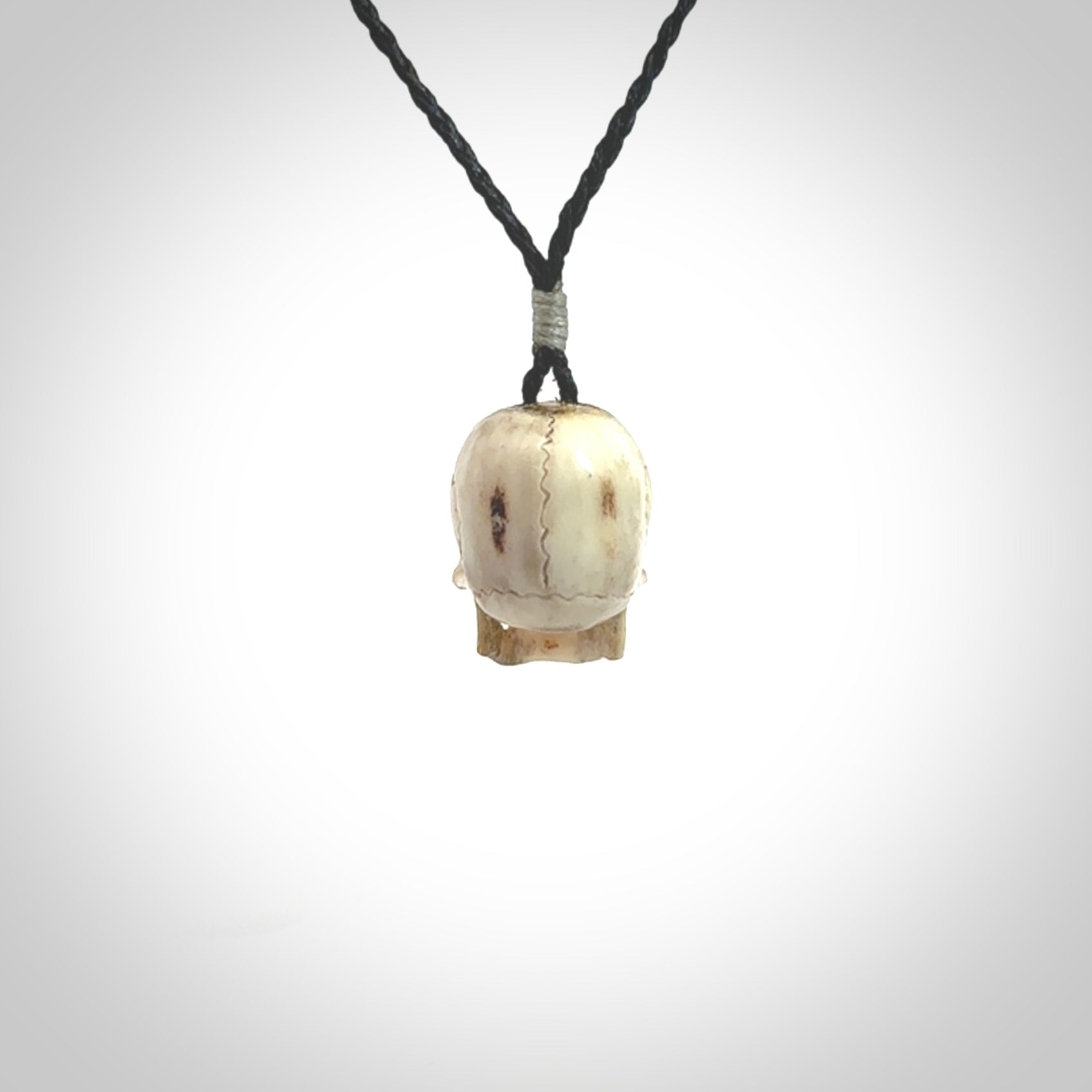 These are handmade skull pendants carved from deer antler. A fantastic piece if you like skulls and would like a medium sized piece. The cord is adjustable so you can wear this where it suits you best. We ship these free worldwide.