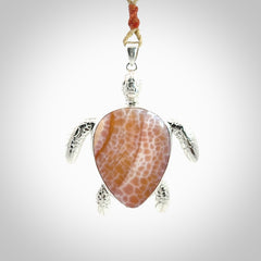 Snakeskin Agate stone turtle in Sterling silver engraved casing. Hand carved jewellery made by NZ Pacific and for sale online.