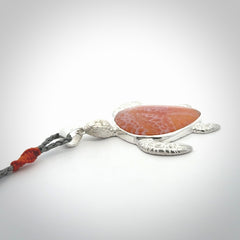 Snakeskin Agate stone turtle in Sterling silver engraved casing. Hand carved jewellery made by NZ Pacific and for sale online.
