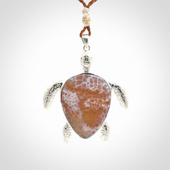 Snakeskin Agate stone turtle in Sterling silver engraved casing. Hand carved jewellery made by NZ Pacific and for sale online.