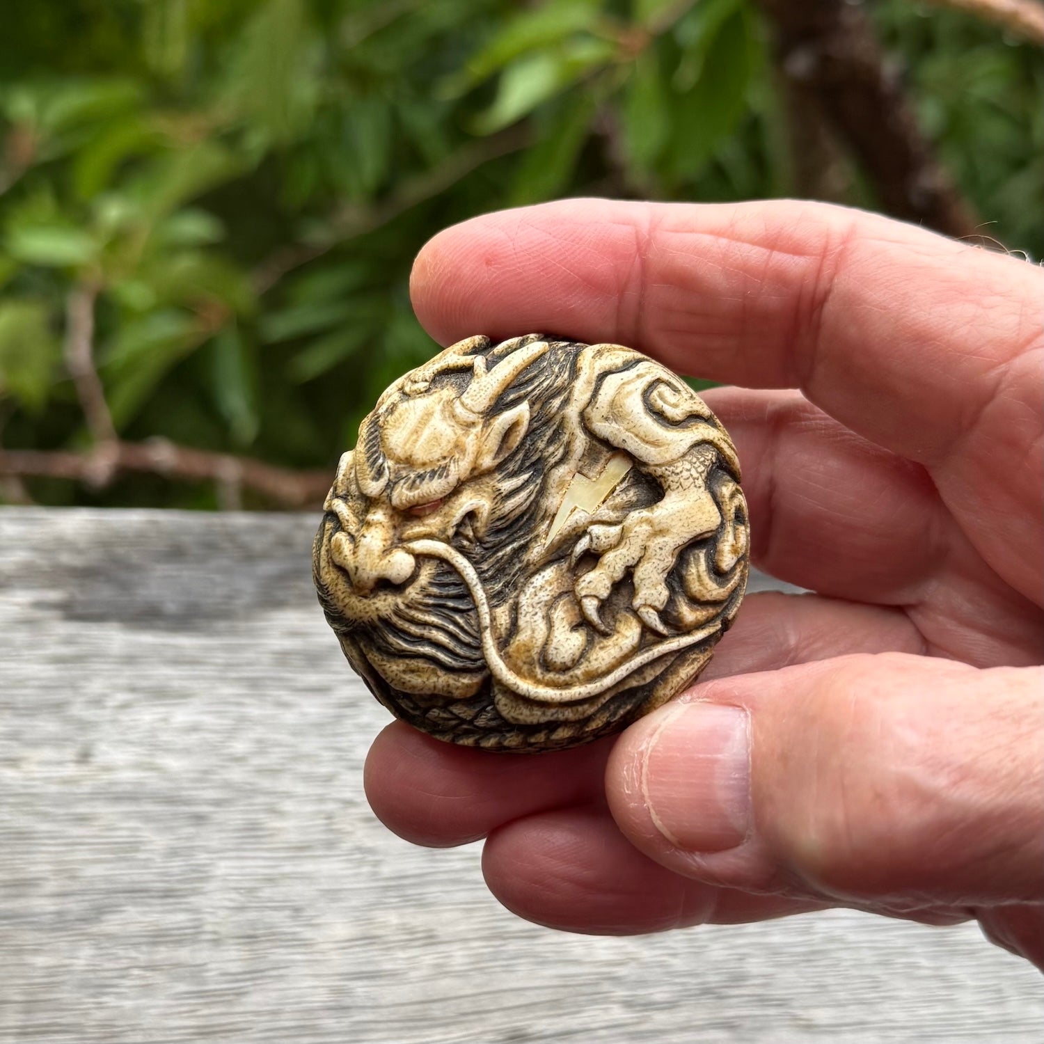 Hand carved red eyed dragon in the clouds made from Deer antler Crown with Mother of Pearl and Gold Leaf. Hand made by master bone carver Fumio Noguchi. Spectacular collectable work of art to display. One only, delivered to you at no extra cost with express courier.