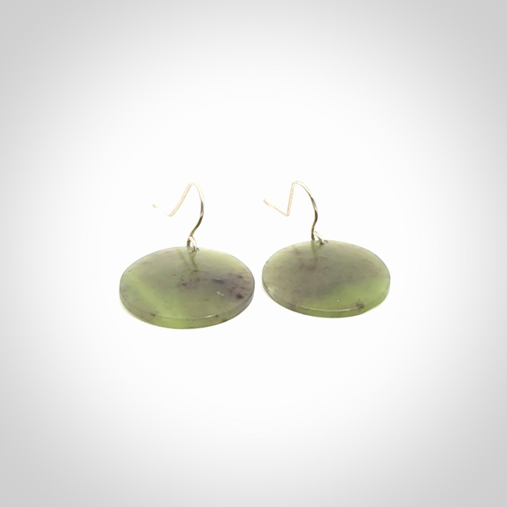 Hand crafted New Zealand Totoweka Jade drop earrings with Sterling Silver Hooks. Jade drop earrings, packaged in a woven kete pouch.