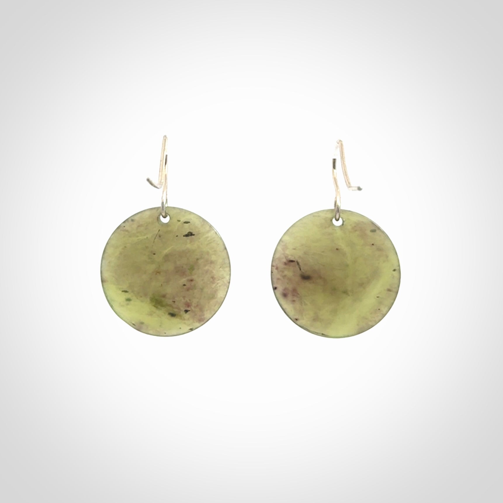 Hand crafted New Zealand Totoweka Jade drop earrings with Sterling Silver Hooks. Jade drop earrings, packaged in a woven kete pouch.