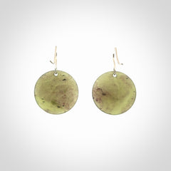 Hand crafted New Zealand Totoweka Jade drop earrings with Sterling Silver Hooks. Jade drop earrings, packaged in a woven kete pouch.