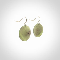 Hand crafted New Zealand Totoweka Jade drop earrings with Sterling Silver Hooks. Jade drop earrings, packaged in a woven kete pouch.