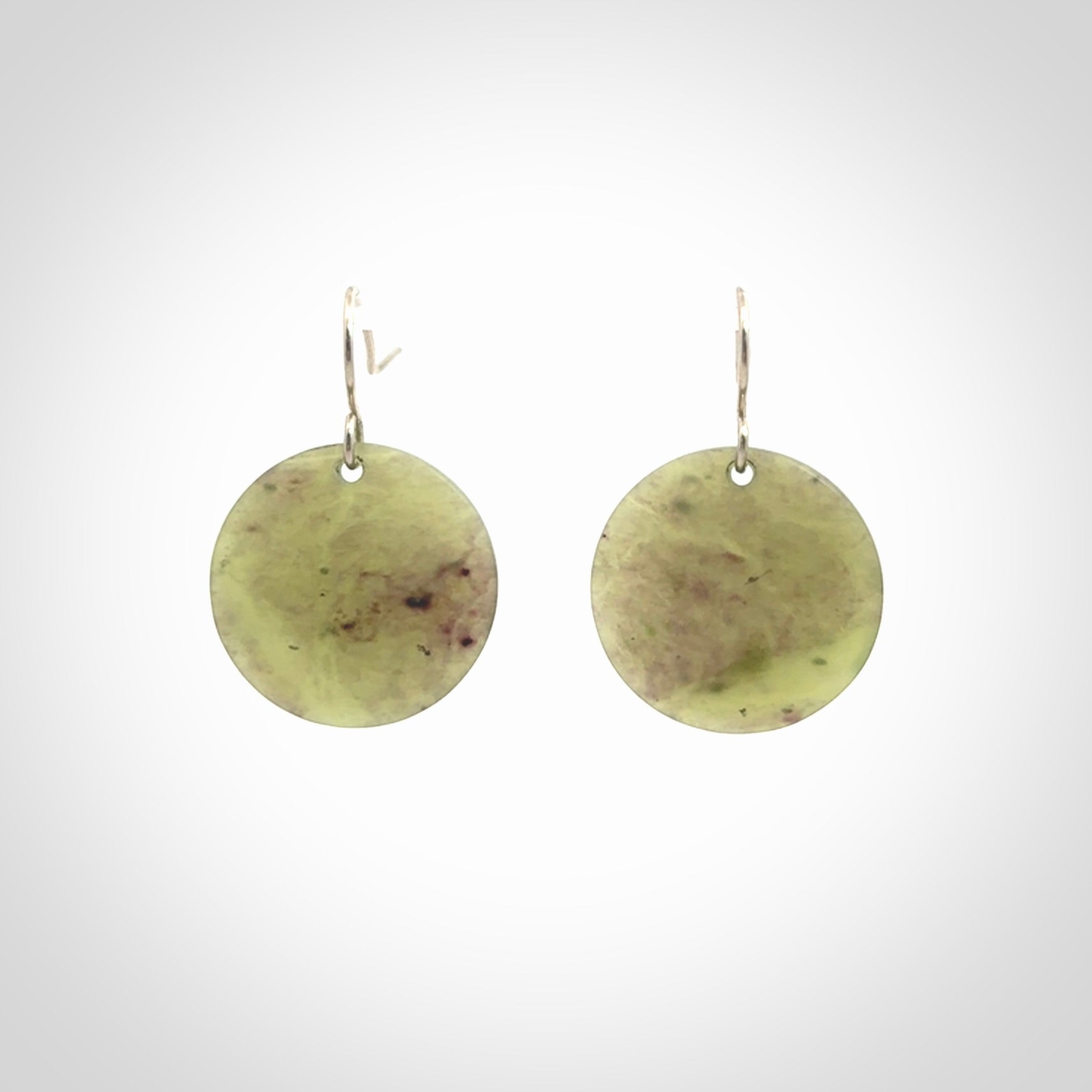 Hand crafted New Zealand Totoweka Jade drop earrings with Sterling Silver Hooks. Jade drop earrings, packaged in a woven kete pouch.