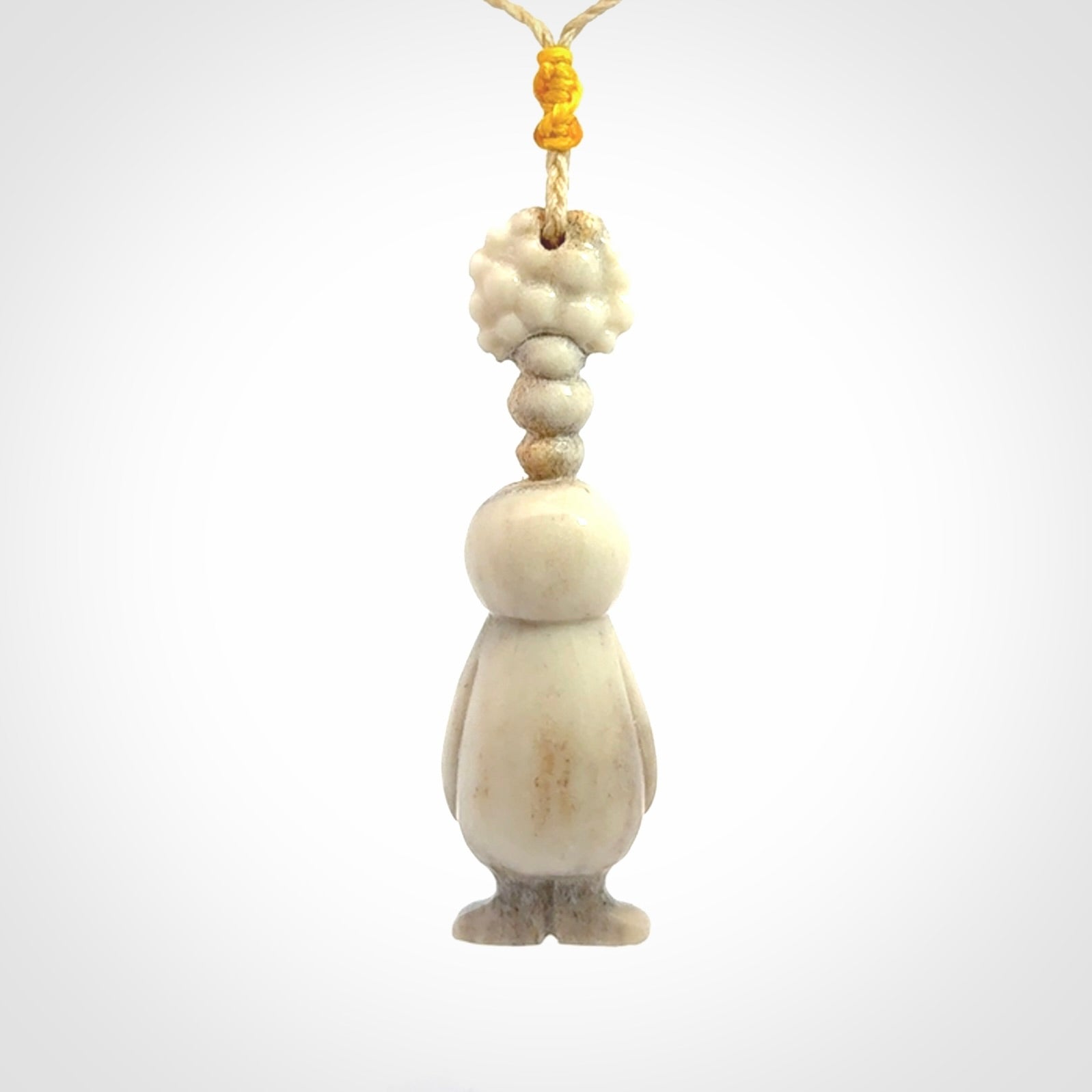 This is a hand carved deer antler daydreaming character pendant. It is made from deer antler, bone. This is a medium-large sized necklace with adjustable cord.