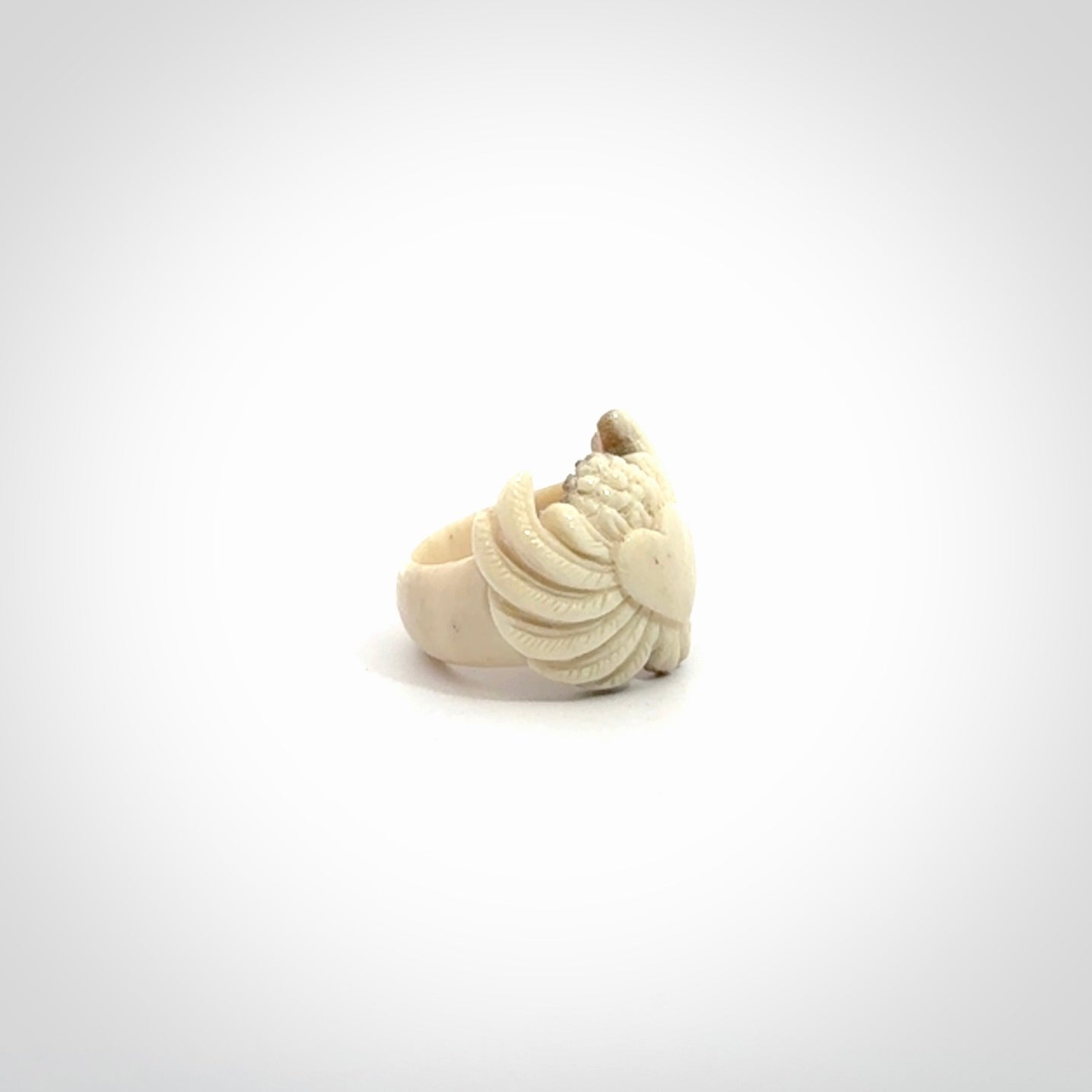 Hand carved deer antler bone winged heart ring.