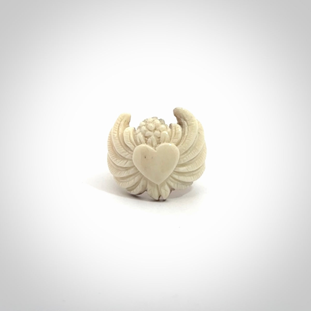 Hand carved deer antler bone winged heart ring.