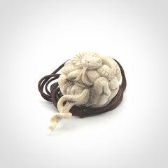 Hand carved deer antler brain with snake pendant. Hand carved by NZ Pacific. Free postage worldwide. Hand made brain with snake head necklace from deer antler. Brain with snake necklace for men and women.