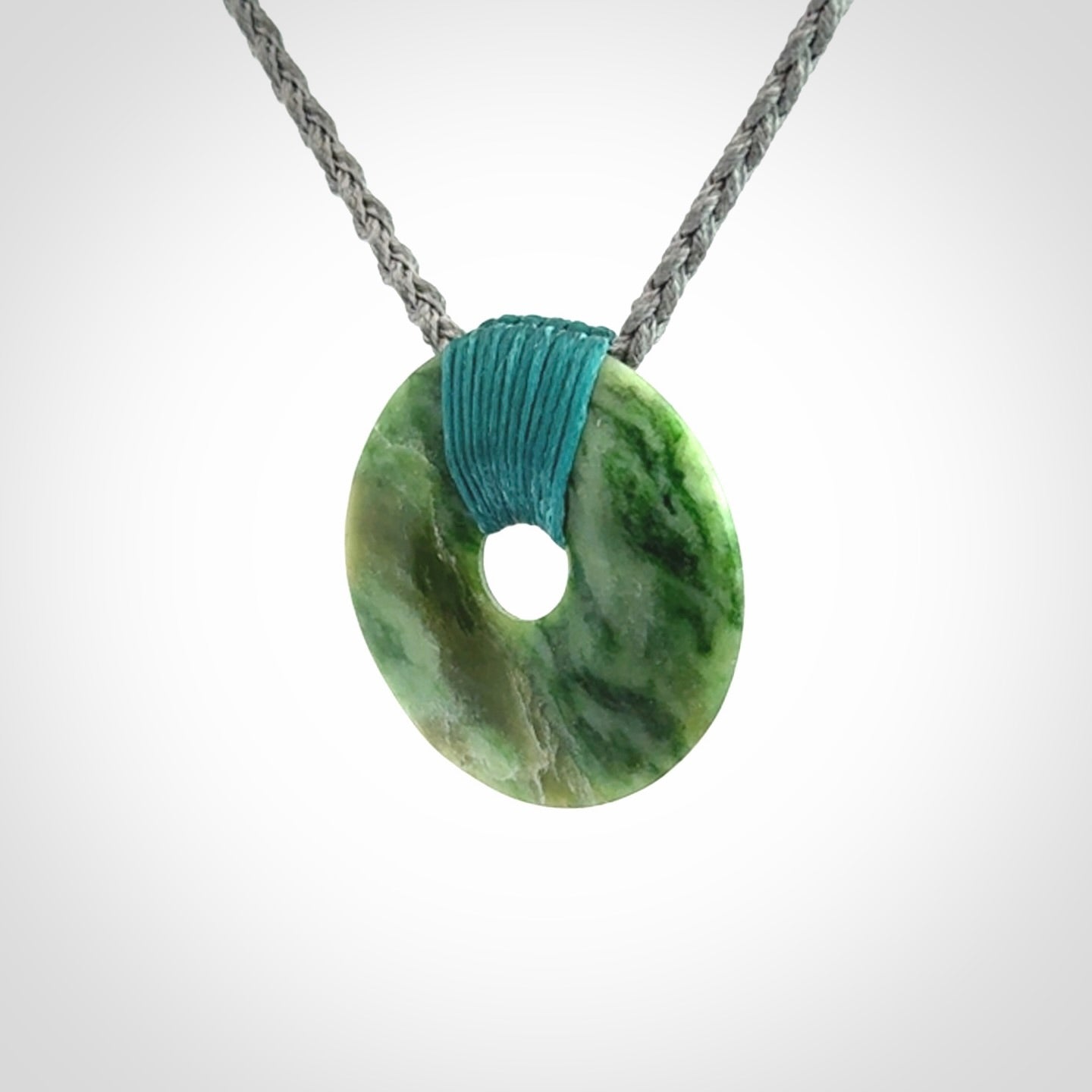 A Unique and Bold Disc Pendant with an Open Heart