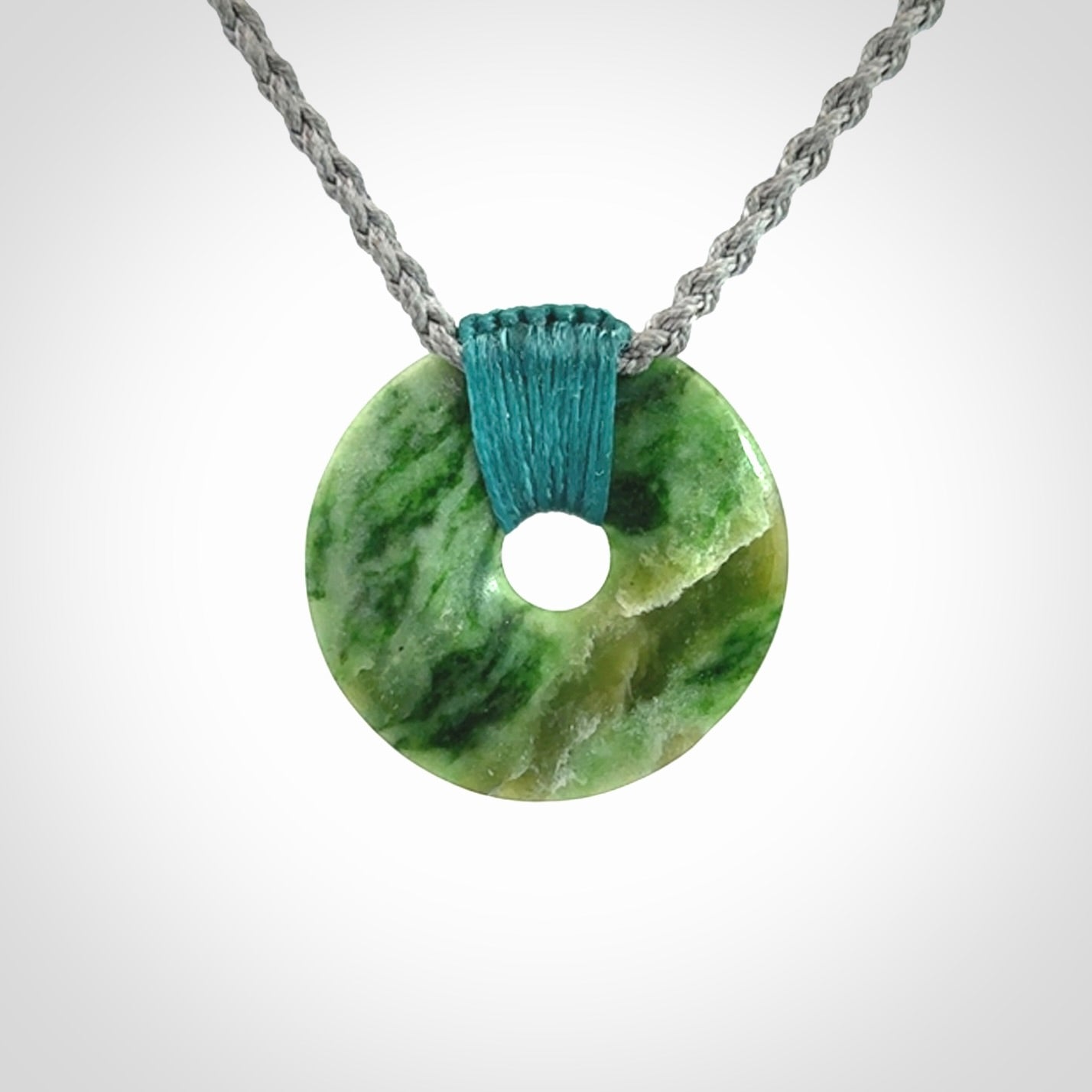 A Unique and Bold Disc Pendant with an Open Heart