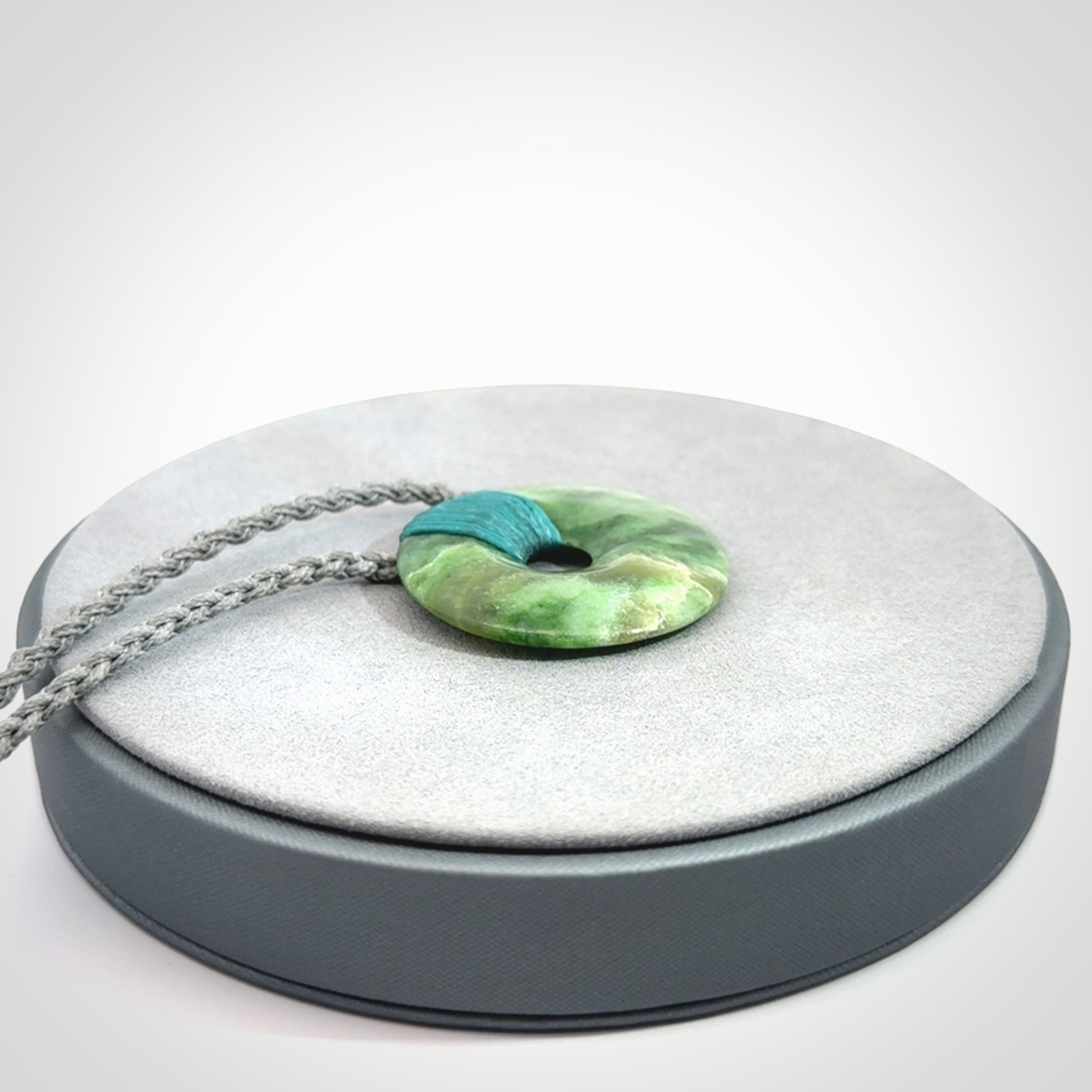 A Unique and Bold Disc Pendant with an Open Heart