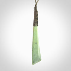 One only larger sized New Zealand jade drop pendant. Hand carved in New Zealand by Donna Summers, jade artist, for NZ Pacific. Provided with Khaki adjustable cord.